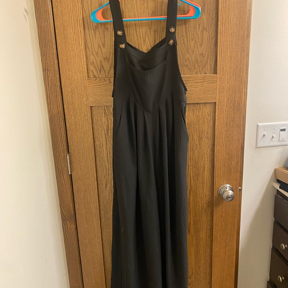 Amazon Black Jumpsuit with Gold Button Accents